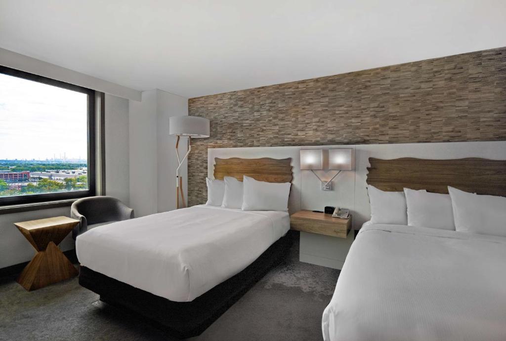 Postel nebo postele na pokoji v ubytování Hilton Hasbrouck Heights-Meadowlands