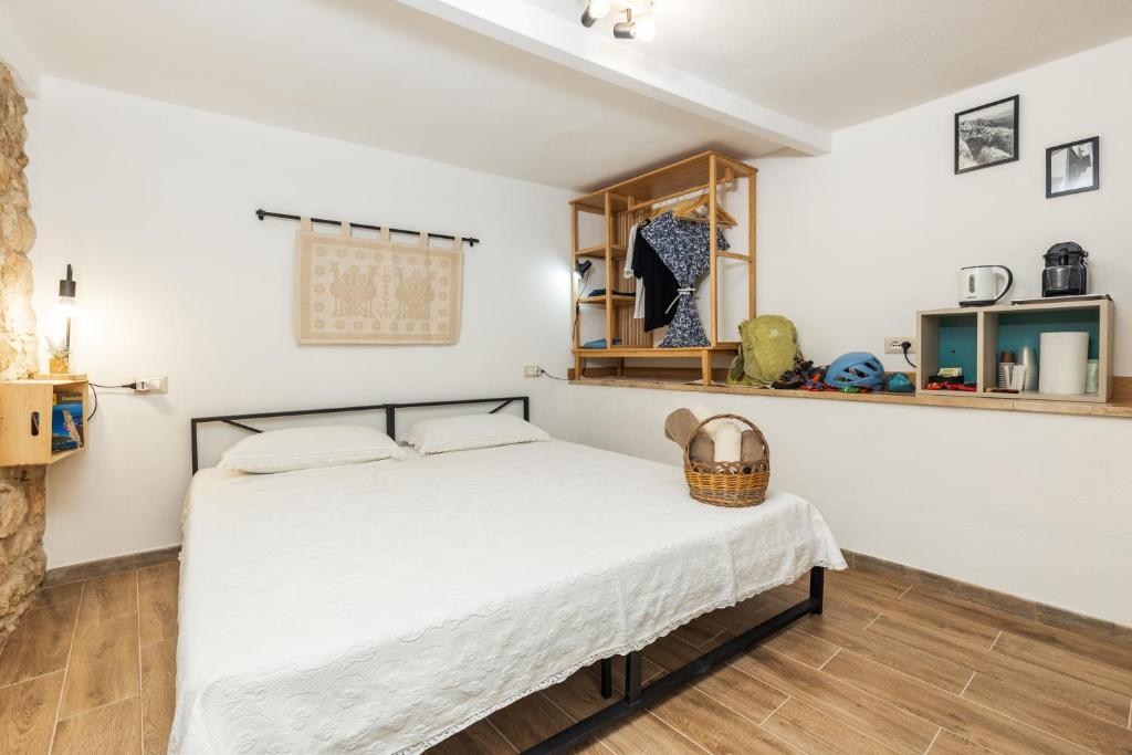Postel nebo postele na pokoji v ubytování Dommu Anna