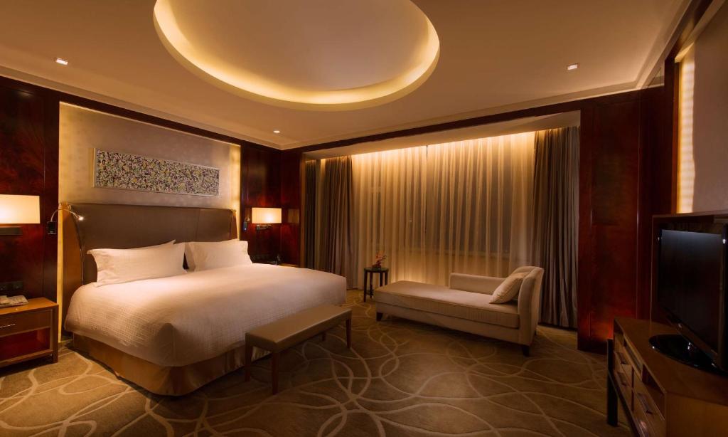 Postel nebo postele na pokoji v ubytování DoubleTree by Hilton Qinghai - Golmud
