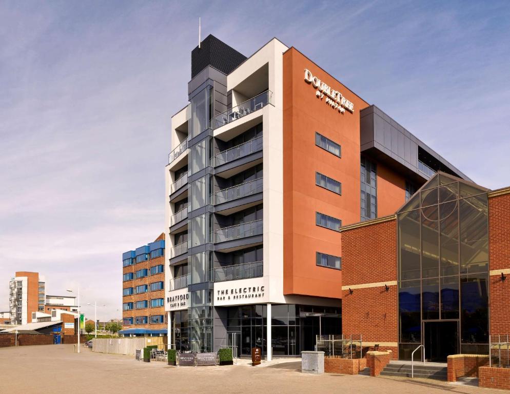 a building with a sign on the side of it at DoubleTree by Hilton Lincoln in Lincoln