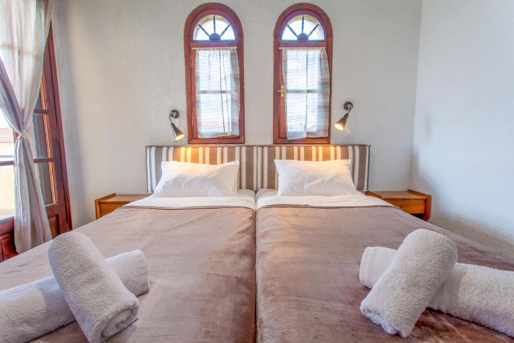 Postel nebo postele na pokoji v ubytování Villa Kalliopi