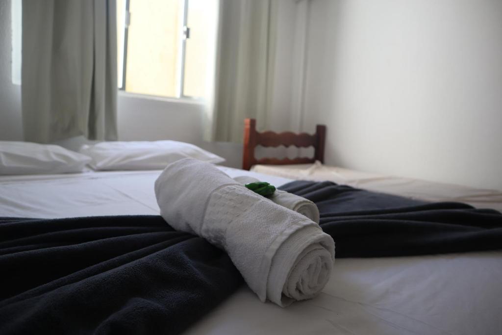 Postel nebo postele na pokoji v ubytování Pousada Lisamar