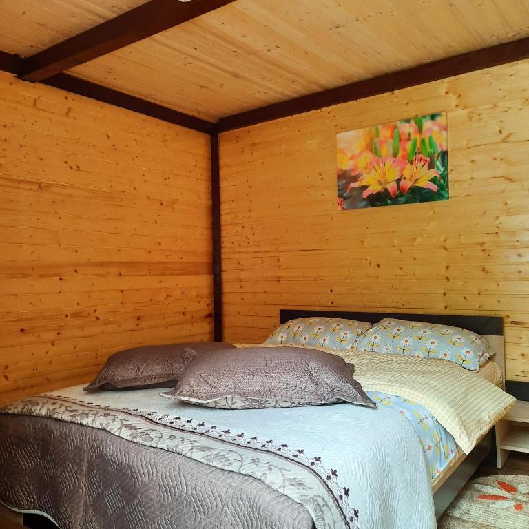 Un pat sau paturi într-o cameră la Mariem