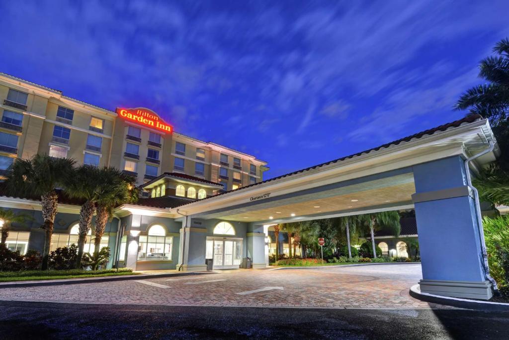 a rendering of a hotel at night at Hilton Garden Inn Orlando Lake Buena Vista in Orlando