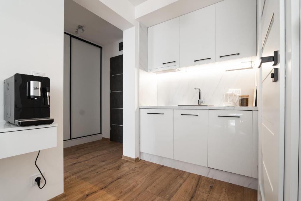 SOLEK, Apartamenty hotelowe i pokoje gościnne ze śniadaniem, przyjazne zwierzętom, wyjątkowe, z widokiem na Jezioro Jamno i w bardzo bliskiej odległości od morza - 17