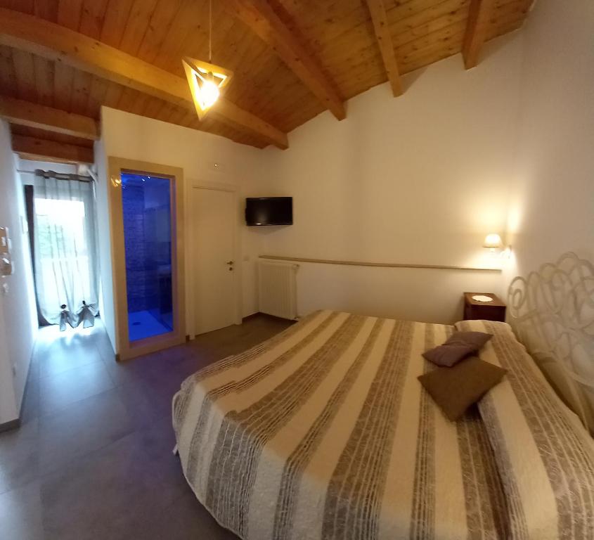 Postel nebo postele na pokoji v ubytování SOTTOSOPRA