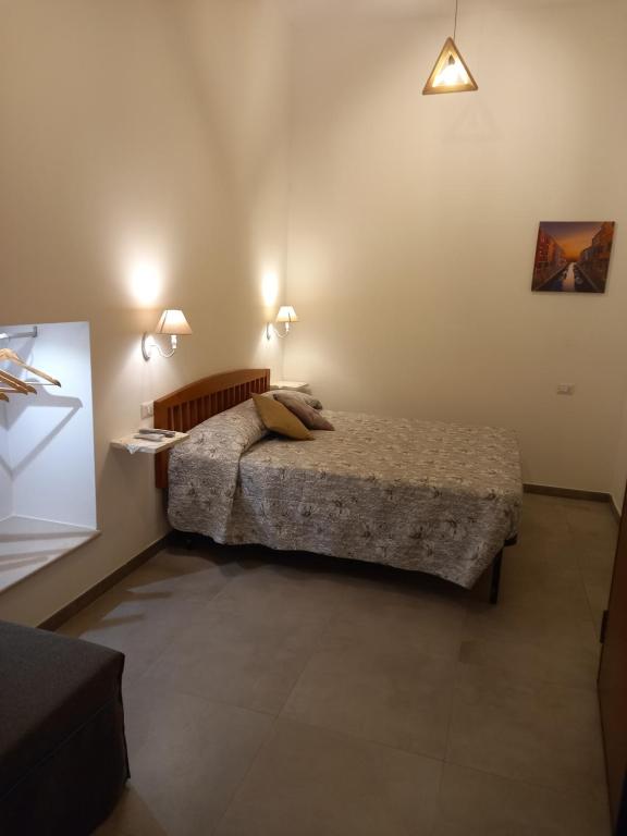 Postel nebo postele na pokoji v ubytování SOTTOSOPRA