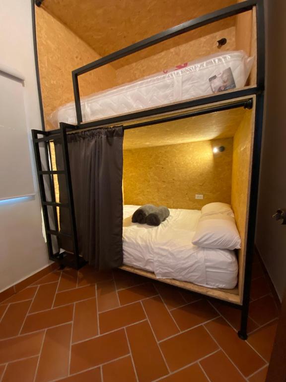 Postel nebo postele na pokoji v ubytování banana hostel