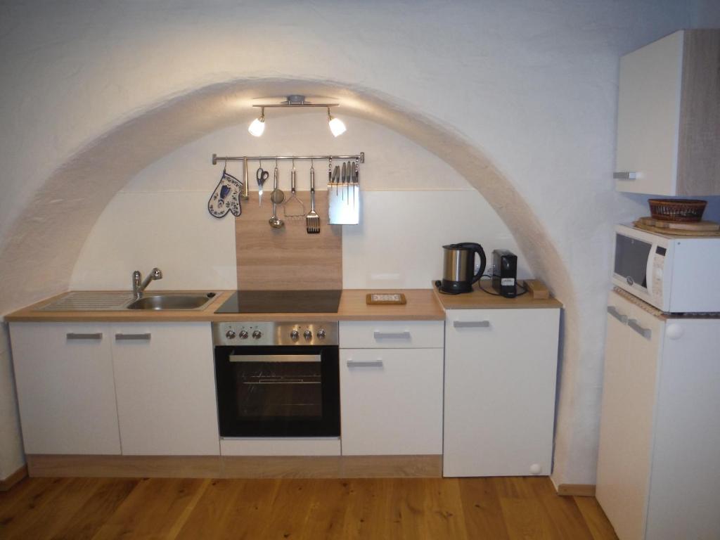 Kuchyň nebo kuchyňský kout v ubytování Ferienwohnung Weberlenz
