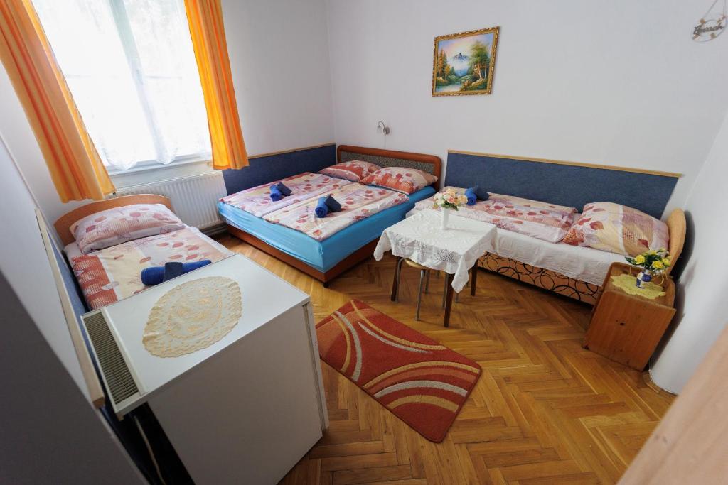 Postel nebo postele na pokoji v ubytování Balaton Panzió