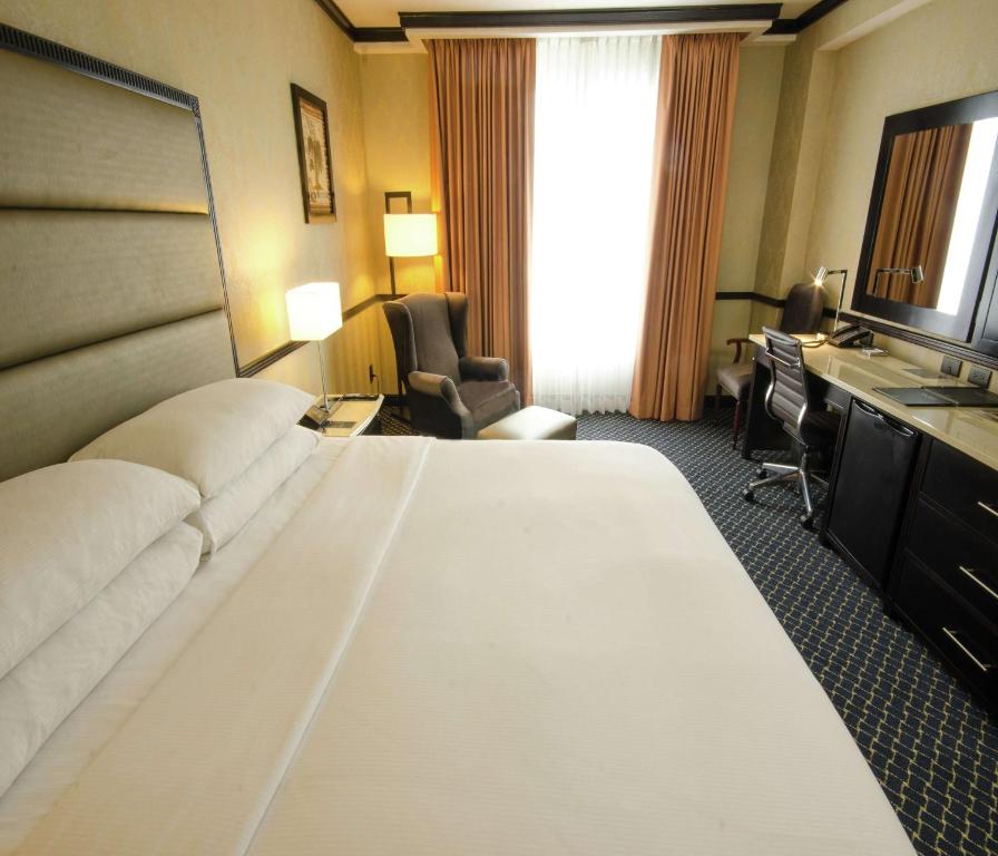 Postel nebo postele na pokoji v ubytování Hilton Princess San Pedro Sula