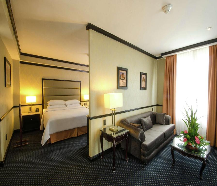 Postel nebo postele na pokoji v ubytování Hilton Princess San Pedro Sula