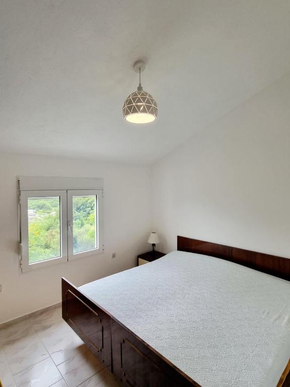 Postel nebo postele na pokoji v ubytování Cozy House Haj Nehaj