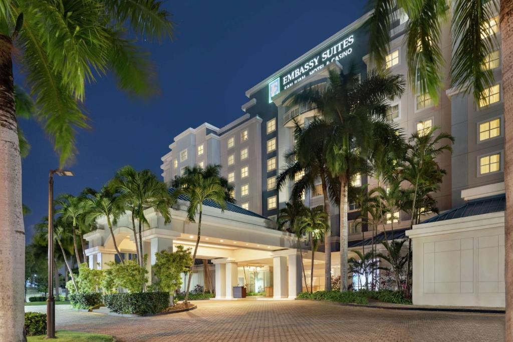 a rendering of the exterior of the resort at night at Embassy Suites by Hilton San Juan - Hotel & Casino in San Juan