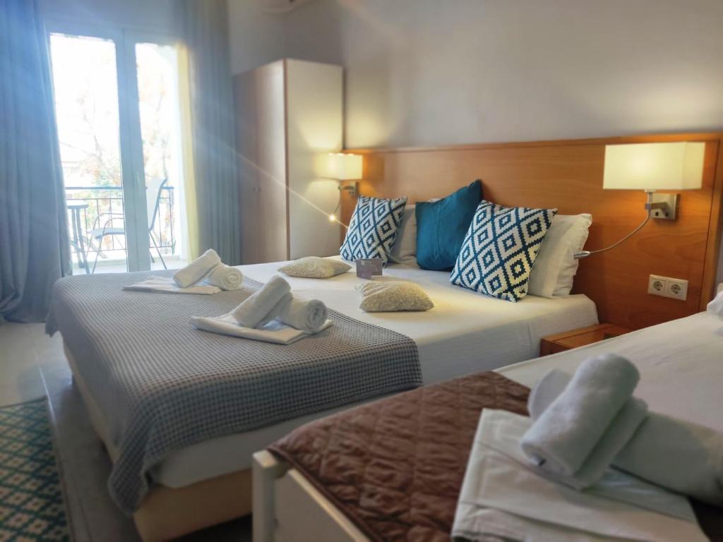 Postel nebo postele na pokoji v ubytování Villa Riviera