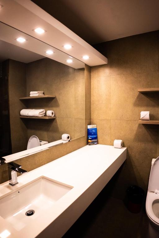 Koupelna v ubytování Hotel Ambato
