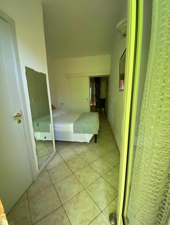 Кровать или кровати в номере Casa centralissima Torre dell Orso 100m dal mare