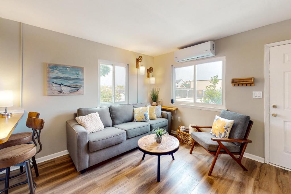 a living room with a couch and a table at AL-BE Vacation Villas # 5 in Ocean City