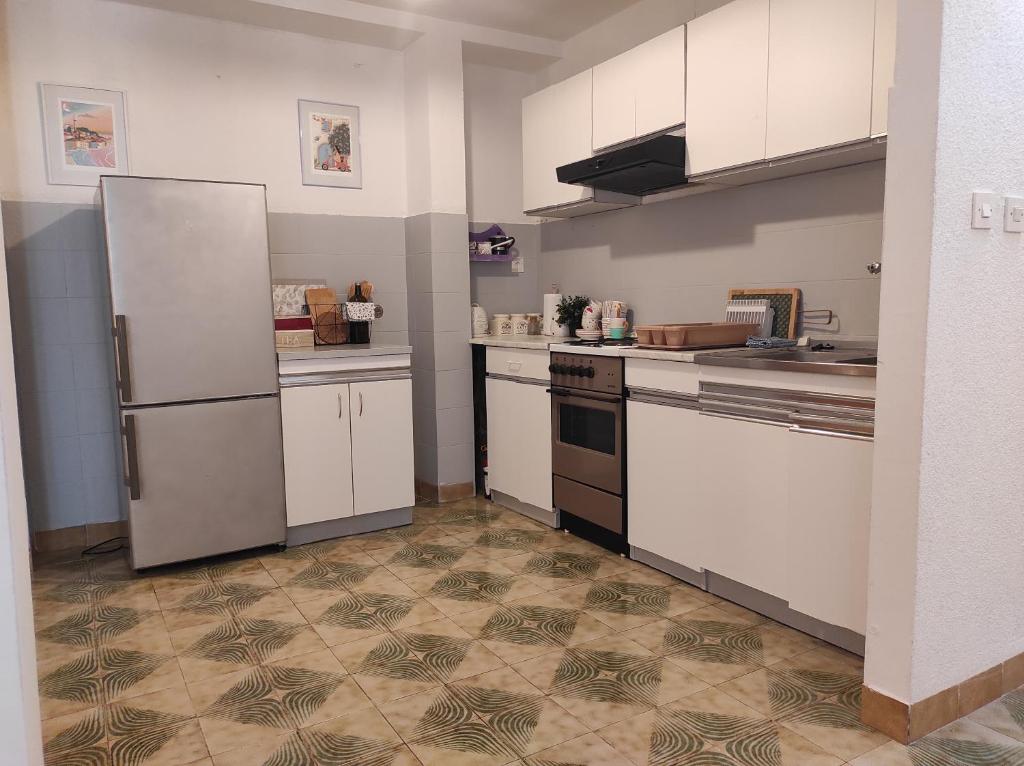 Kuchyňa alebo kuchynka v ubytovaní Studio apartment Tonći