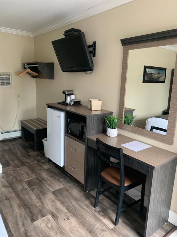 Kuchyň nebo kuchyňský kout v ubytování Cairns Motel