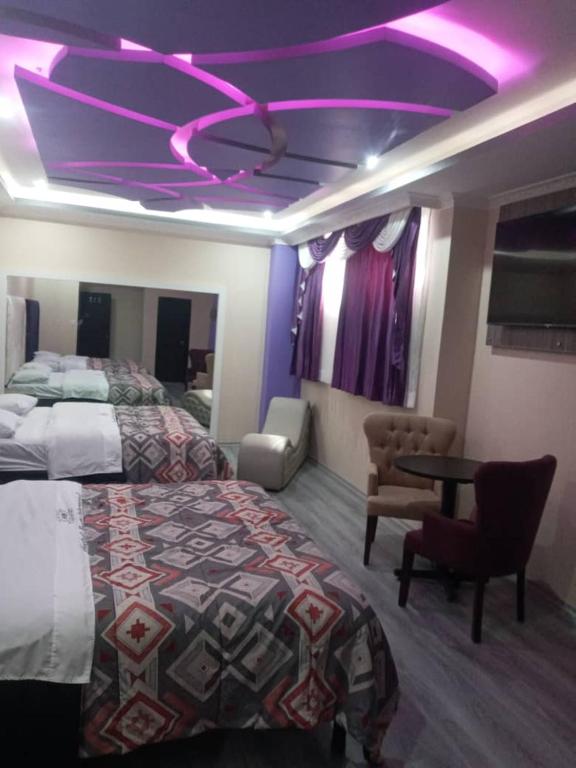 Postel nebo postele na pokoji v ubytování Hostal Kapital II