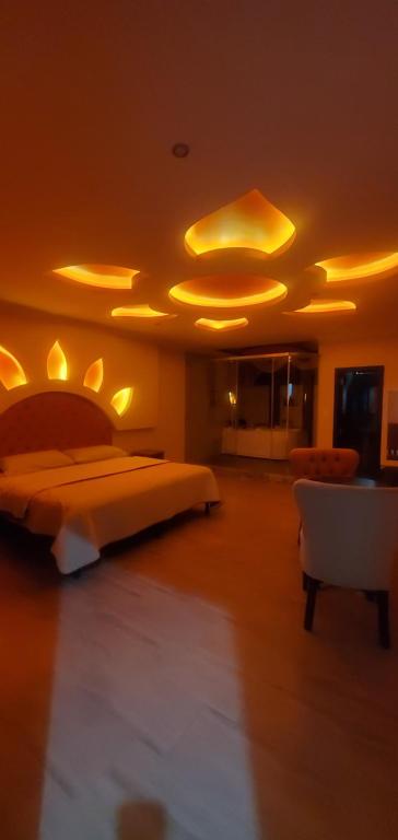 Postel nebo postele na pokoji v ubytování Hostal Kapital II