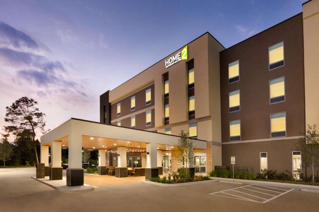 a rendering of a hotel with the front of the building at Home2 Suites by Hilton Shenandoah The Woodlands in The Woodlands
