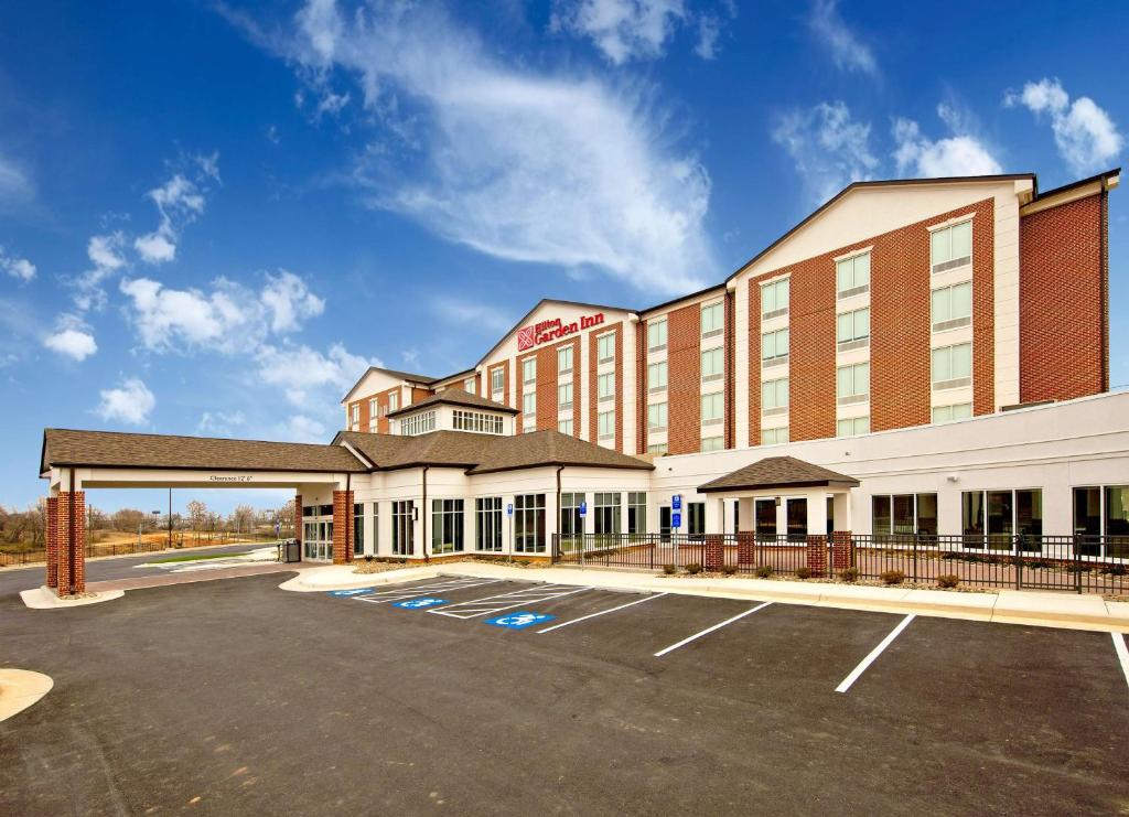 a rendering of a hotel with a parking lot at Hilton Garden Inn Martinsburg in Martinsburg