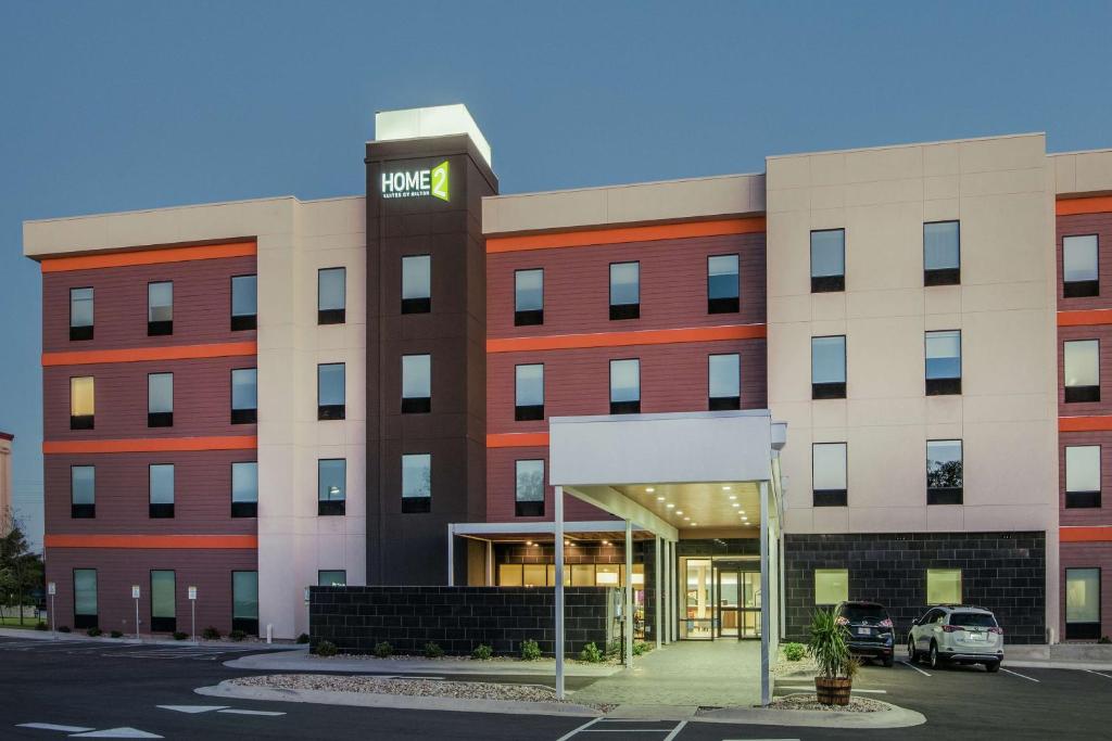 a rendering of the front of a hotel at Home2 Suites By Hilton Austin Airport in Austin