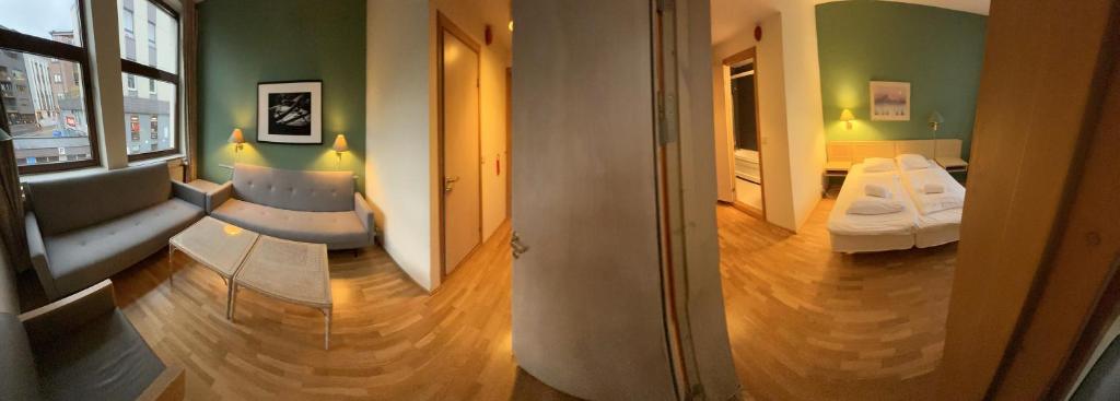 Postel nebo postele na pokoji v ubytování Mitt hotell & apartments