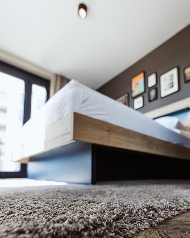 Postel nebo postele na pokoji v ubytování Emma by Schulz Hotel Berlin Friedrichshain