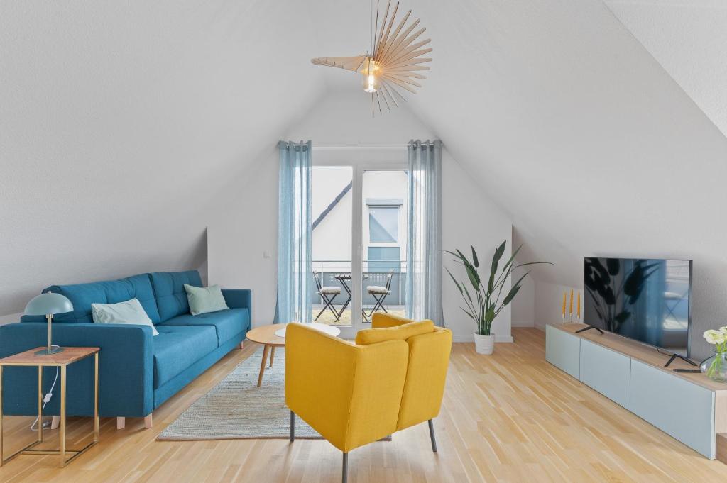 TV a/nebo společenská místnost v ubytování Design-Apartment - Küche - Balkon - Tiefgarage