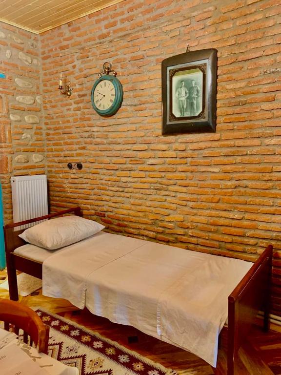 Postel nebo postele na pokoji v ubytování Dabakhnebi