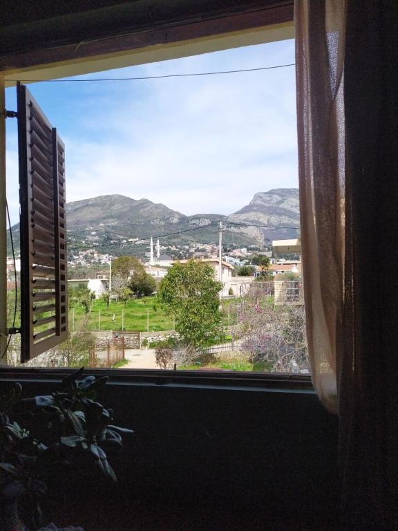 a window with a view of a mountain view at Relax zone in Bar