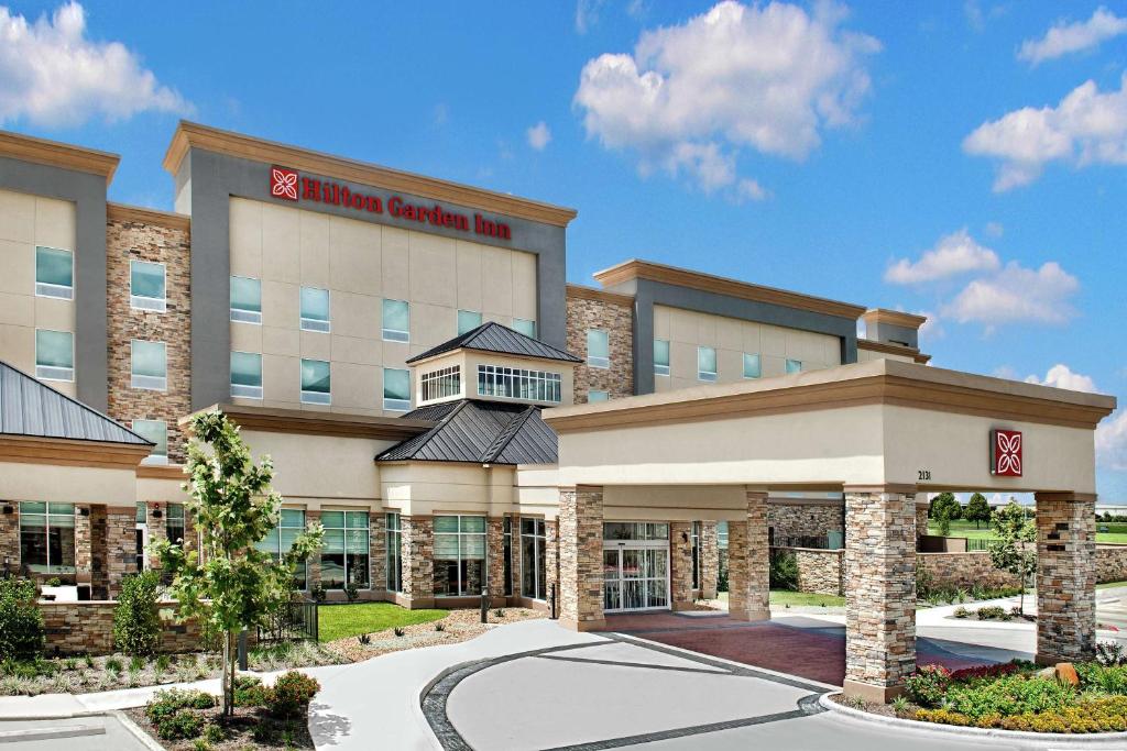 a rendering of the exterior of a hotel at Hilton Garden Inn San Marcos in San Marcos