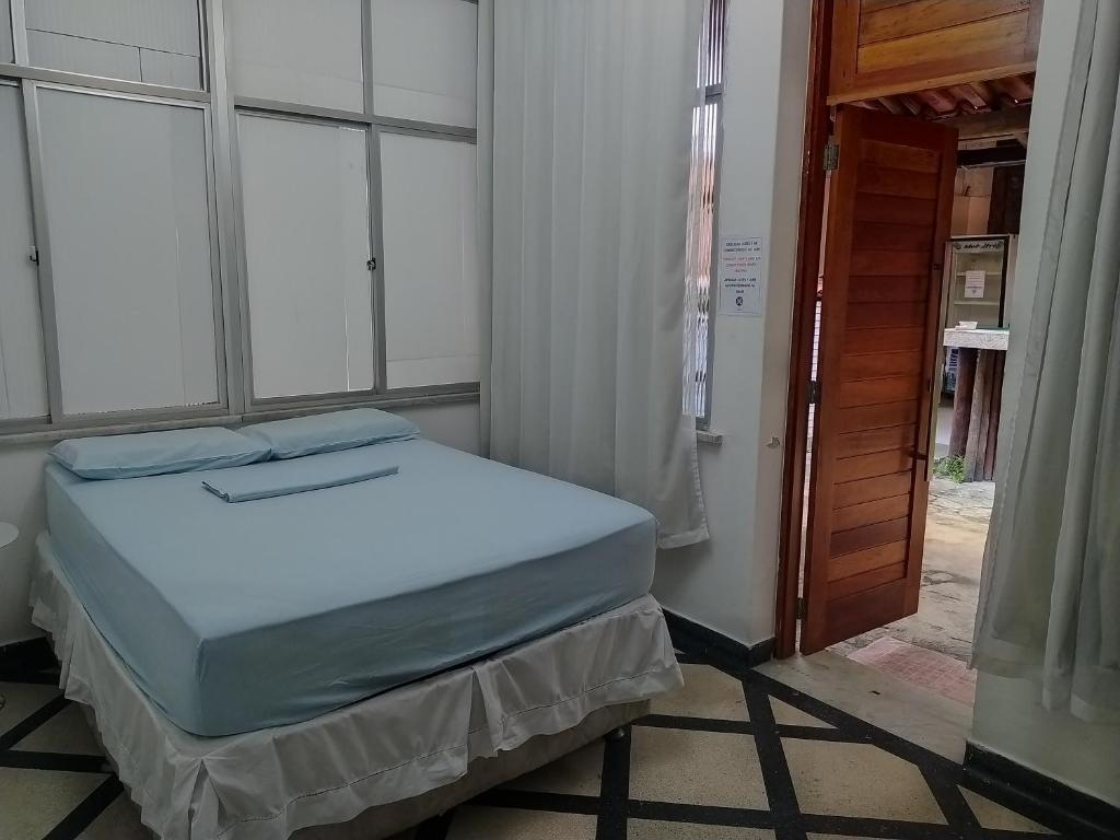 Postel nebo postele na pokoji v ubytování Hostel Casarão 65