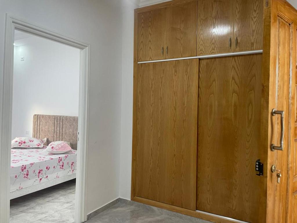 Postel nebo postele na pokoji v ubytování Ibrahim apartment