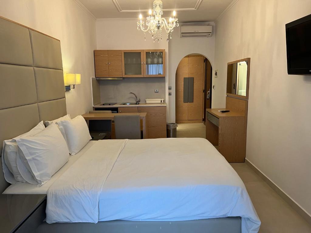 Postel nebo postele na pokoji v ubytování Valtos Beach Hotel