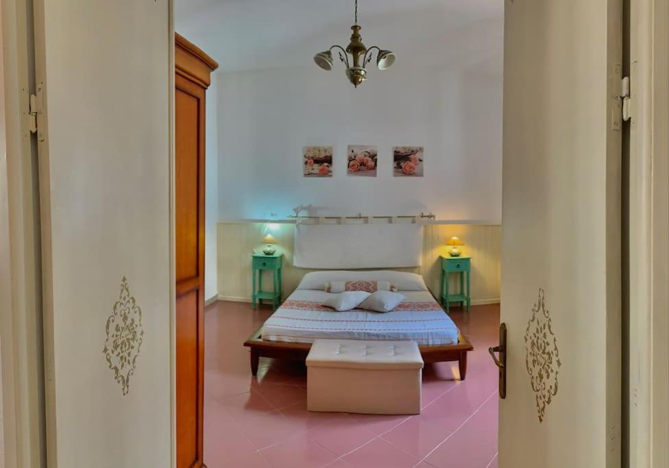 Ένα ή περισσότερα κρεβάτια σε δωμάτιο στο Casa vacanze Nuraghe Orosei