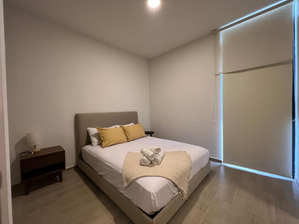 Postel nebo postele na pokoji v ubytování Departamento Ajijic Jalisco.