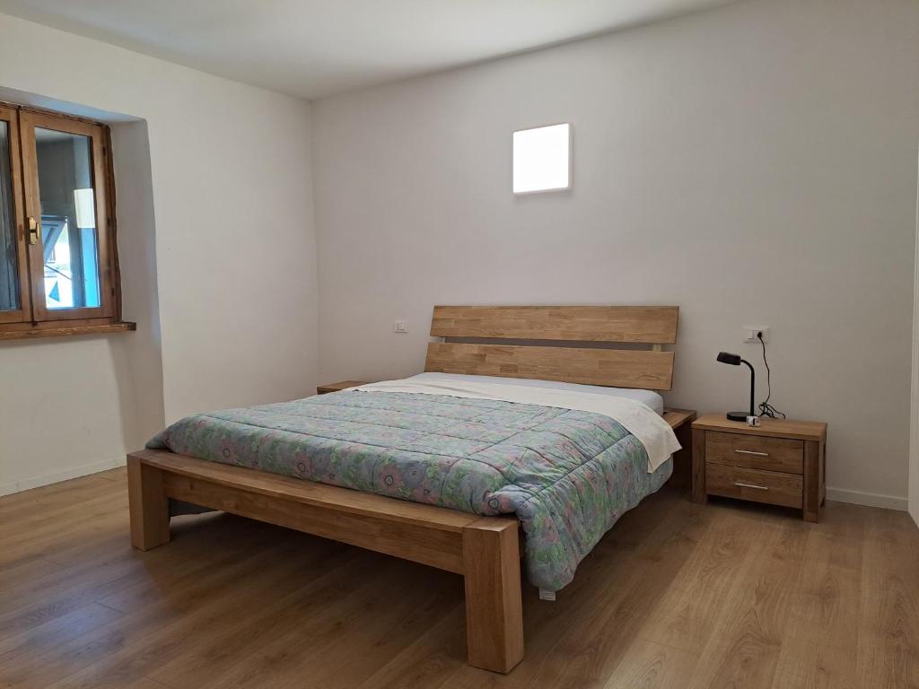 Postel nebo postele na pokoji v ubytování Ca' Leoni