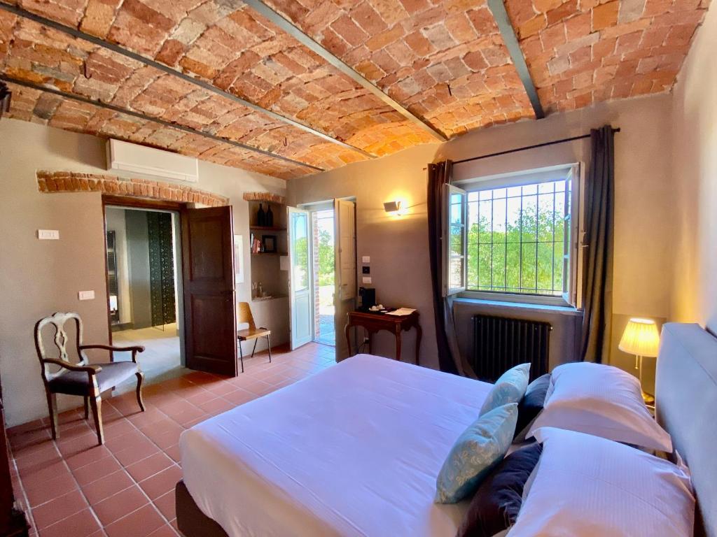 Postel nebo postele na pokoji v ubytování MiaClara Relais