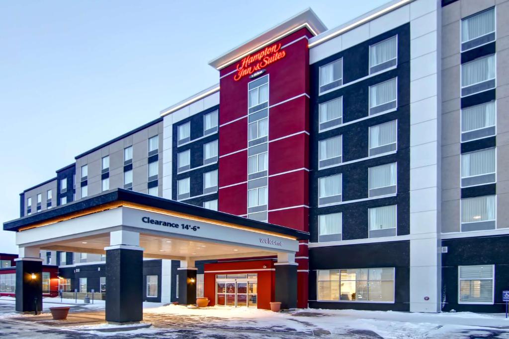 a rendering of the entrance to a hotel at Hampton Inn & Suites by Hilton Grande Prairie in Grande Prairie