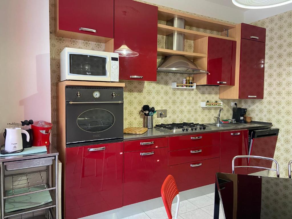 Kuchyň nebo kuchyňský kout v ubytování Guest House MICINI