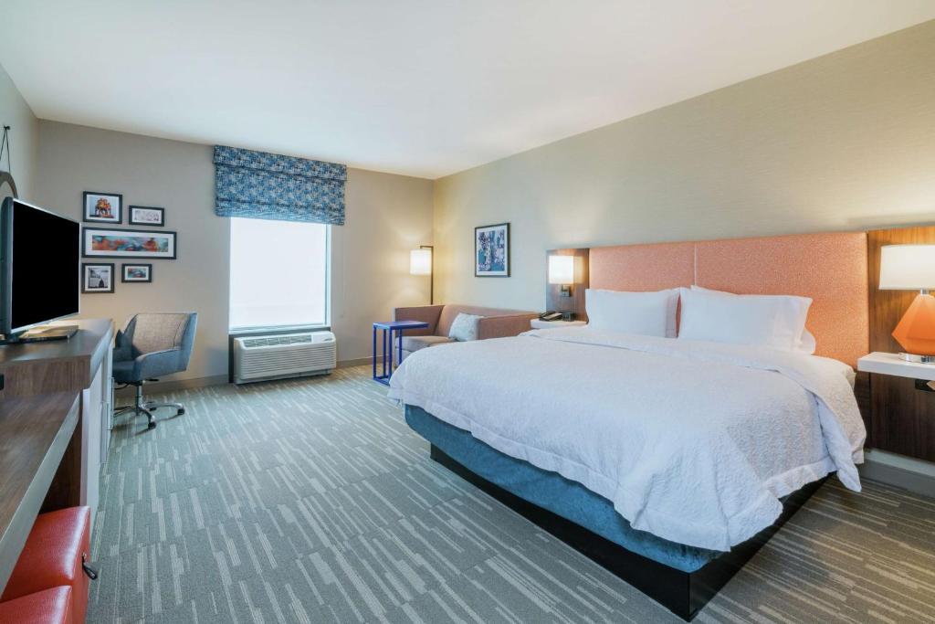 Ein Bett oder Betten in einem Zimmer der Unterkunft Hampton Inn &amp; Suites Glenarden&#47;Washington DC