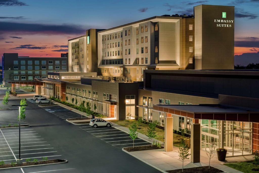 a rendering of a building with a parking lot at Embassy Suites By Hilton Noblesville Indianapolis Conv Ctr in Noblesville