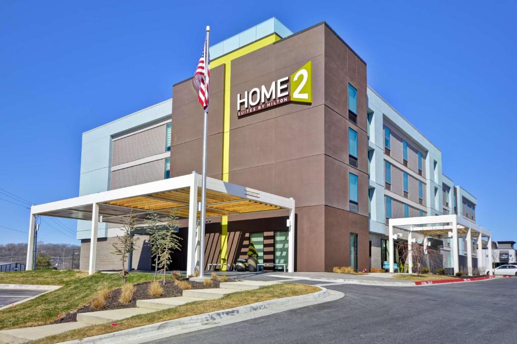 an office building with a home sign on it at Home2 Suites by Hilton Kansas City KU Medical Center in Kansas City