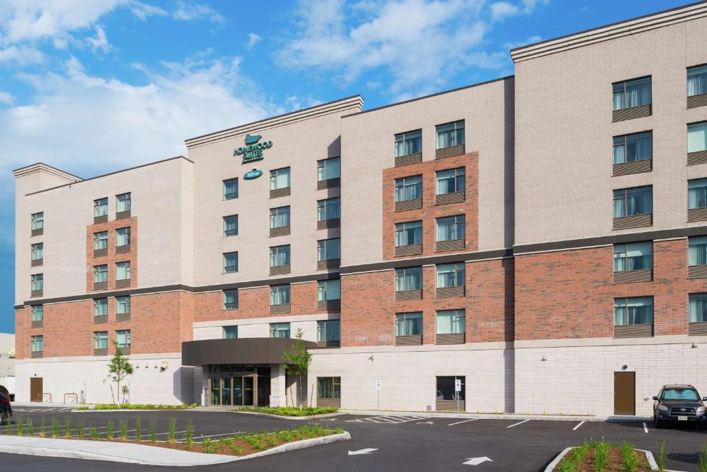 a rendering of the front of the hotel at Homewood Suites By Hilton Ottawa Airport in Ottawa