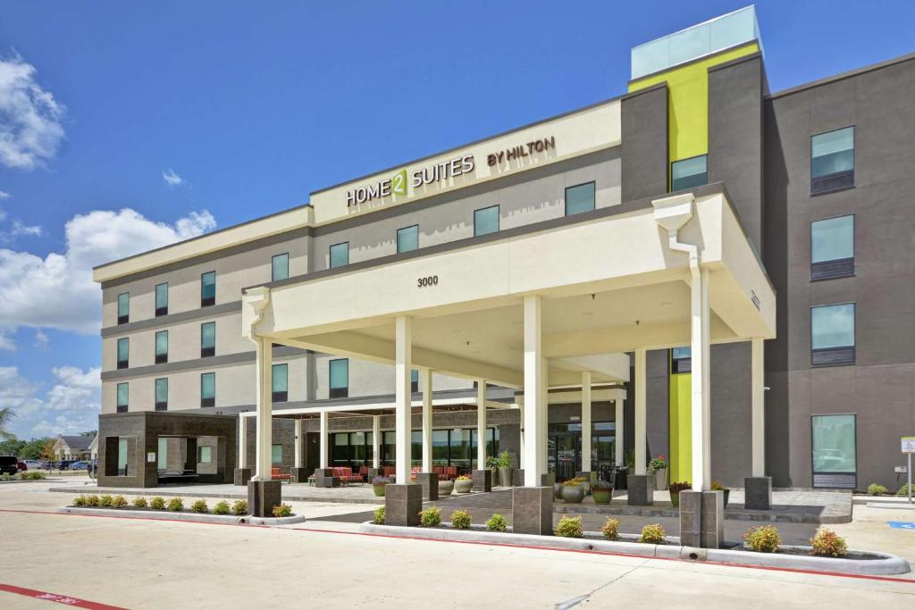 a rendering of the front of a hotel building at Home2 Suites By Hilton Texas City Houston in Texas City