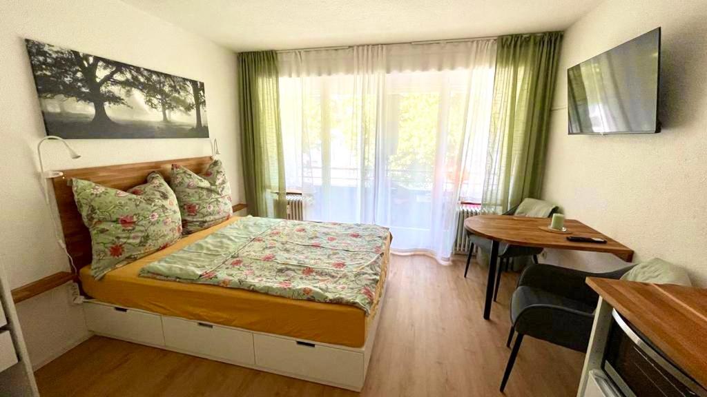 Postel nebo postele na pokoji v ubytování Wohlfühlen im Herzen von Schopfheim